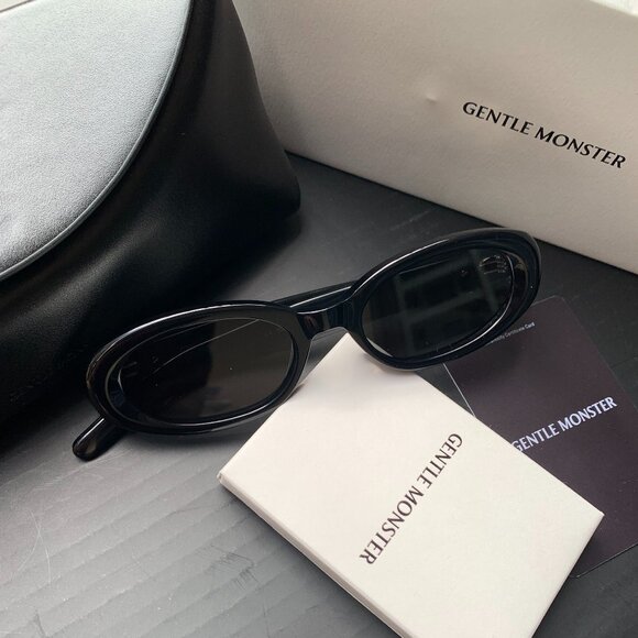 Gentle Monster Black Oval Sunglasses w/ Gold Logo – Chic & Trendy main image 6